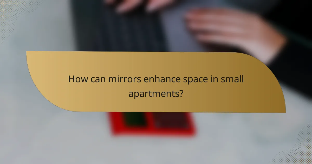 How can mirrors enhance space in small apartments?
